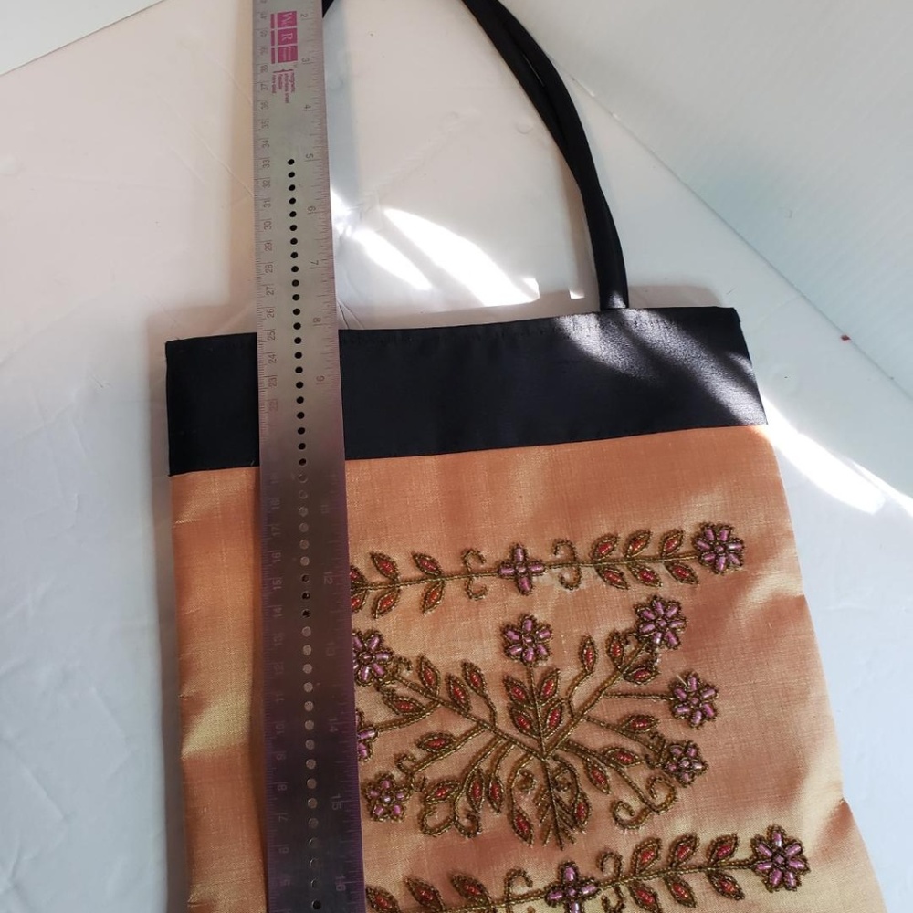 Orange and black beaded handbag